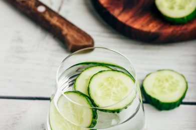 Detox water with sliced cucumber in a drinking glass